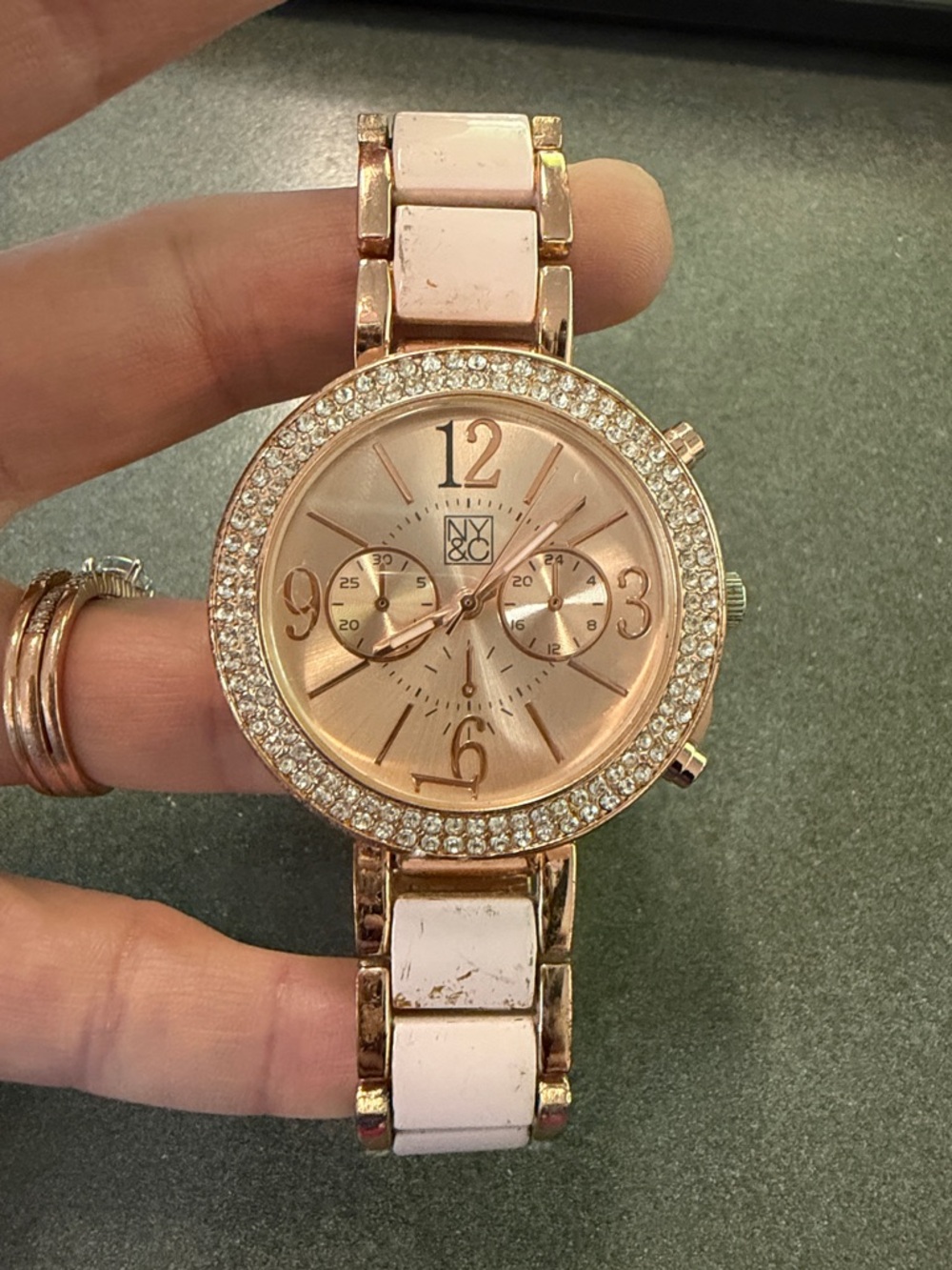 rose gold New York & Company watch with a crystal-encrusted bezel